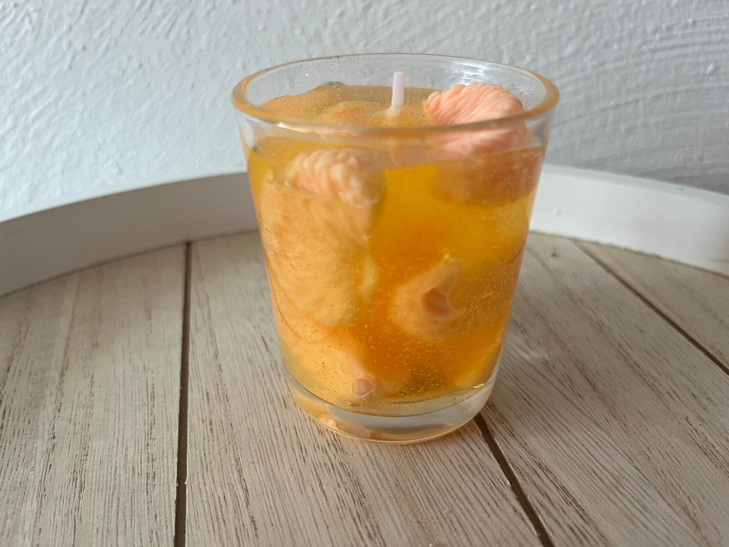 Orangenkerzen im Glas